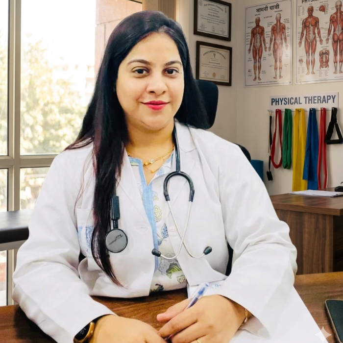 Doctor NIdhi Sharma in a white coat with a stethoscope in MyPhysio clinic